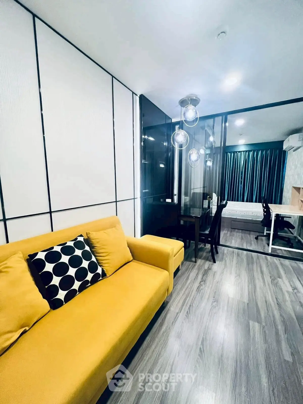 Modern apartment interior with yellow sofa and stylish lighting