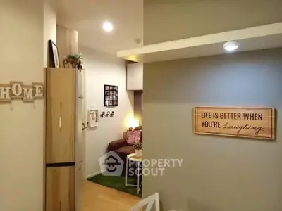 Cozy living room with stylish decor and warm lighting, perfect for relaxation and entertainment.