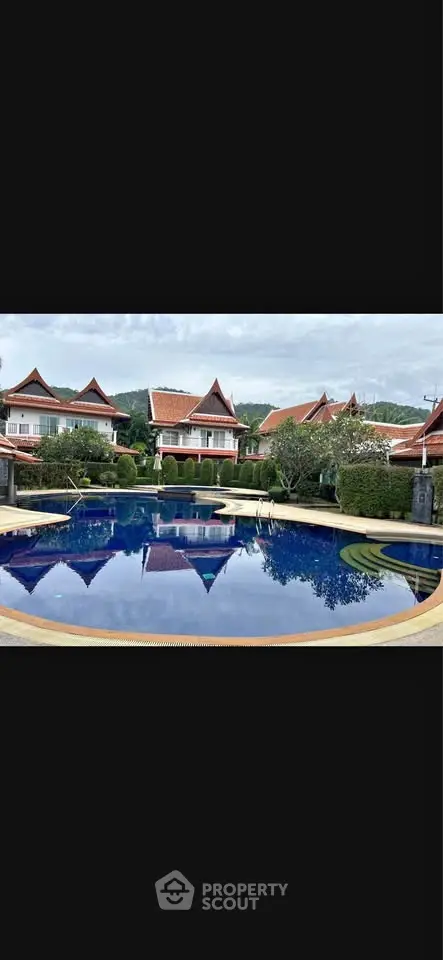 Luxurious villa complex with stunning pool and traditional architecture