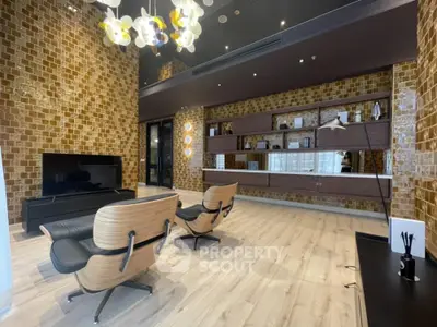 Luxurious modern living room with stylish chairs and elegant lighting