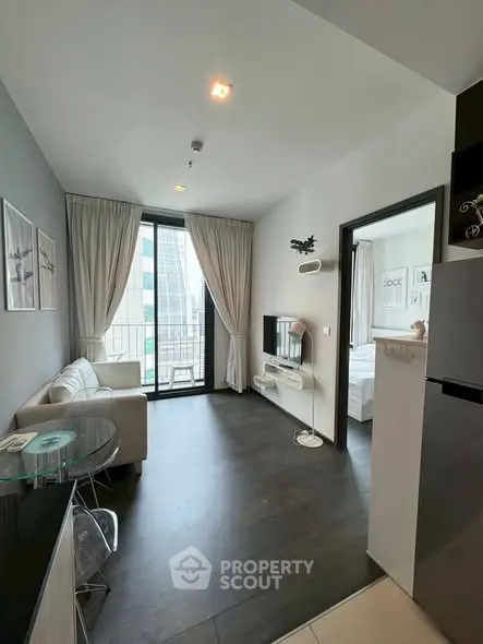Modern living room with balcony view in stylish apartment