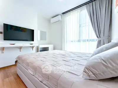 Bright and modern bedroom with large window and stylish decor