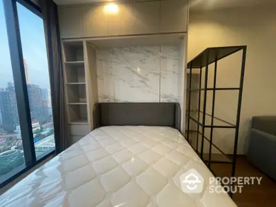 Modern bedroom with city view and stylish decor