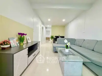 Spacious modern living room with sleek furniture and elegant decor