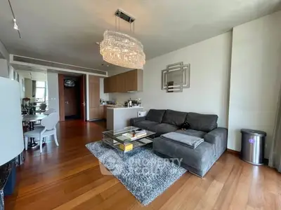 Luxurious living room with elegant chandelier and modern decor