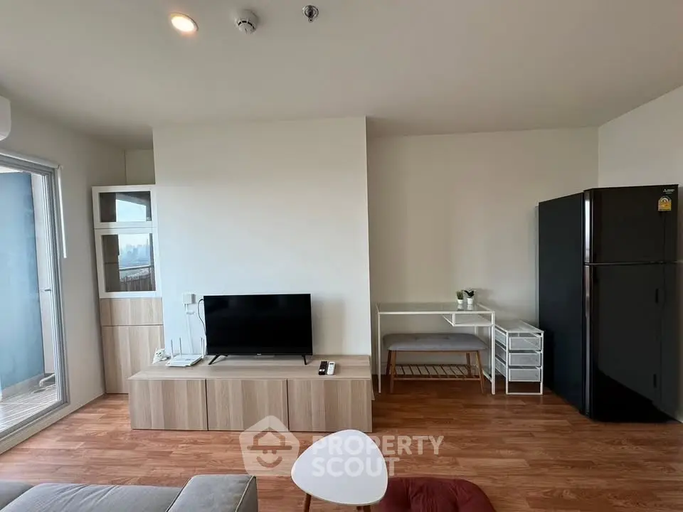 Modern living room with sleek TV setup and stylish furniture