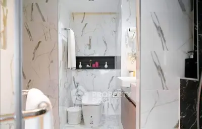Luxurious marble bathroom with modern fixtures and elegant design