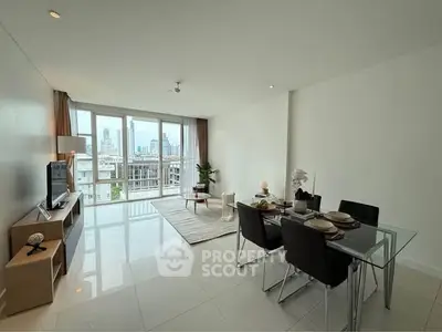 Spacious modern living room with city view and elegant dining area