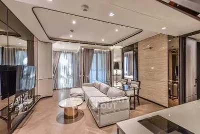 Luxurious modern living room with elegant decor and large windows
