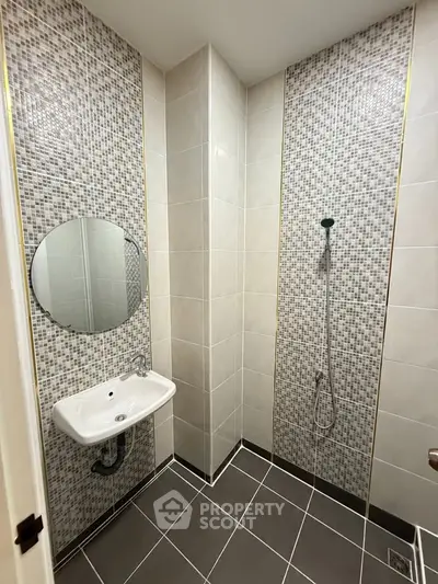Modern bathroom with stylish tile design and sleek fixtures