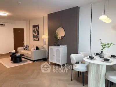 Modern living room with stylish decor and dining area, featuring elegant furniture and soft lighting.