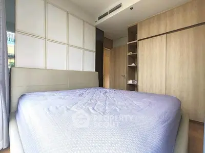 Spacious bedroom with modern design and ample storage space
