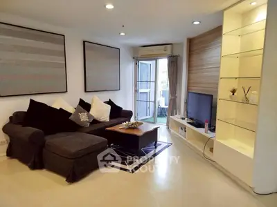 Stylish living room with modern decor and cozy seating area