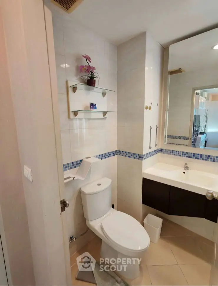 Modern bathroom with sleek fixtures and elegant tile design