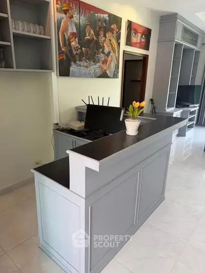 Chic modern living room with stylish bar counter and elegant decor, perfect for entertaining guests.