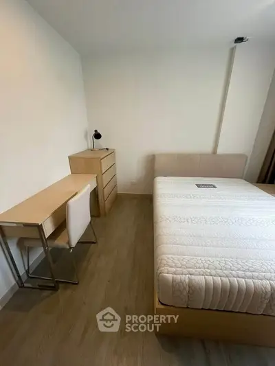 Modern bedroom with minimalist furniture and cozy ambiance