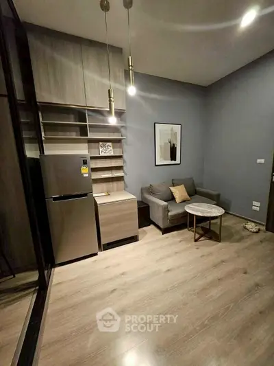 Modern living room with sleek furniture and stylish lighting