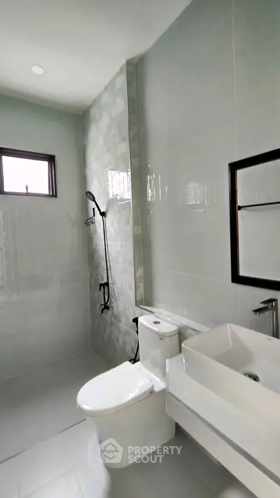 Modern bathroom with sleek fixtures and natural light
