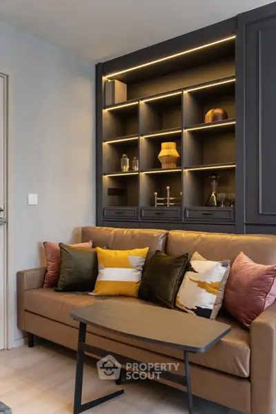 Stylish living room with modern shelving and cozy sofa