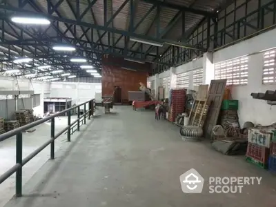 Spacious industrial warehouse with high ceilings and ample storage space