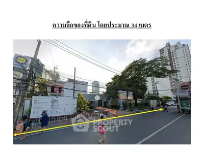 Prime real estate location with street view and nearby amenities in urban setting.