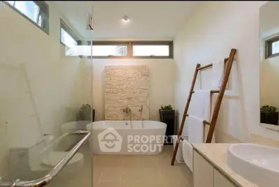 Luxurious modern bathroom with freestanding bathtub and elegant decor