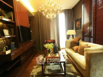 Luxurious living room with elegant chandelier and cozy seating area