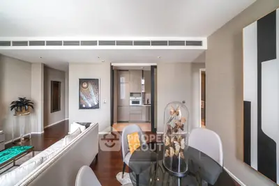 Luxurious modern living room with elegant decor and open kitchen layout