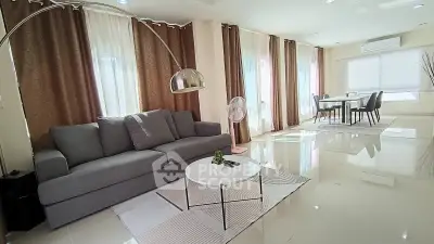 Spacious modern living room with elegant decor and natural light