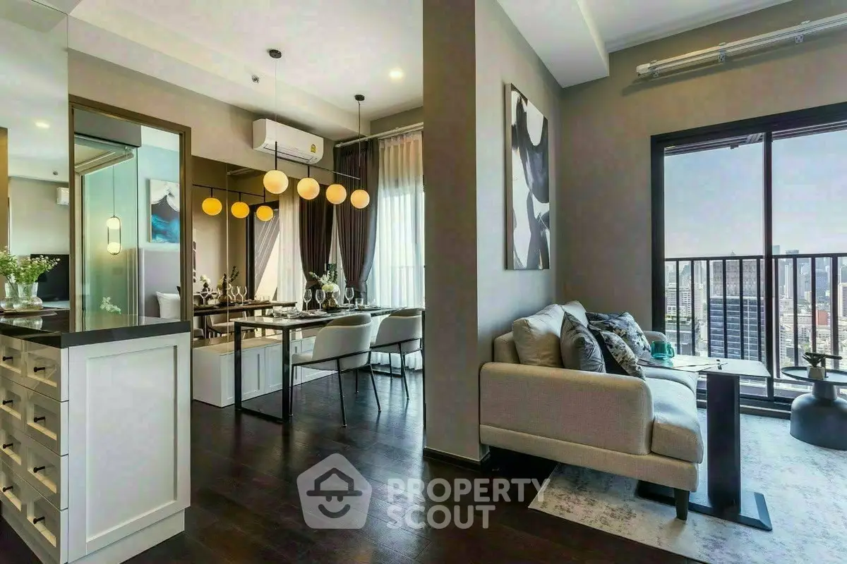 Modern living room with city view, stylish decor, and elegant dining area in a high-rise apartment.