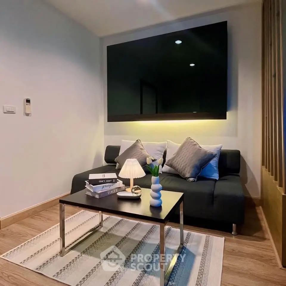 Modern living room with sleek furniture and ambient lighting