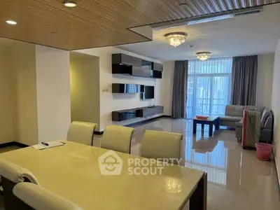Spacious modern living room with elegant dining area and natural light