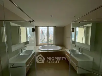 Luxurious bathroom with city view and modern fixtures
