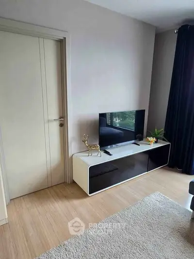 Modern living room with sleek TV stand and minimalist decor