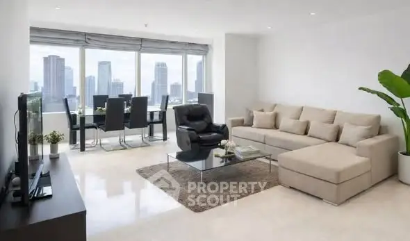 Spacious modern living room with city view and elegant dining area