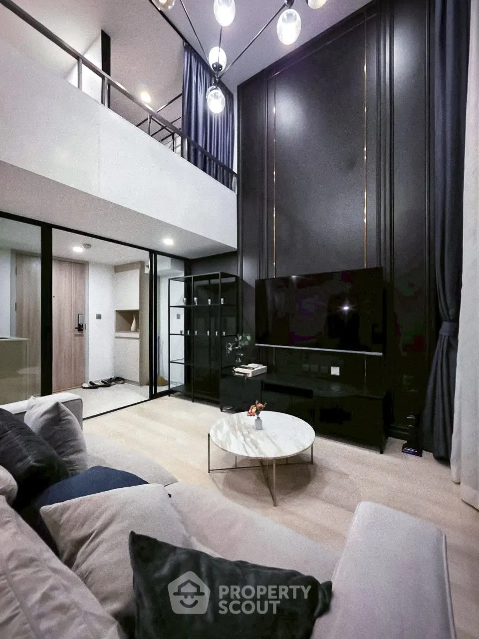 Luxurious modern living room with high ceilings and elegant decor