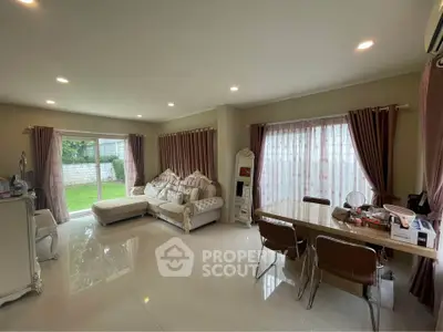 Spacious living room with elegant decor and garden view