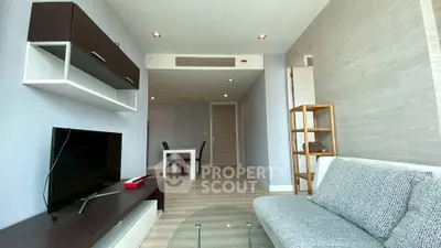 Modern living room with sleek furniture and open layout, perfect for contemporary living.