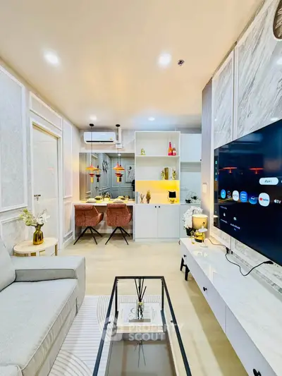 Modern living room with stylish decor, open layout, and elegant furnishings in a contemporary apartment.