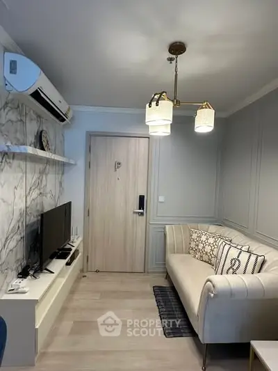 Cozy living room with modern decor and air conditioning