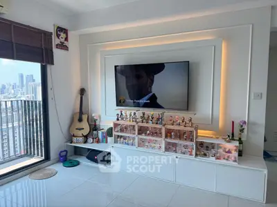 Modern living room with city view, featuring TV, guitar, and collectibles display.