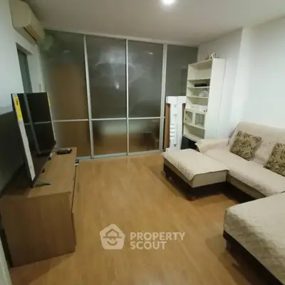 Cozy living room with modern furniture and wooden flooring