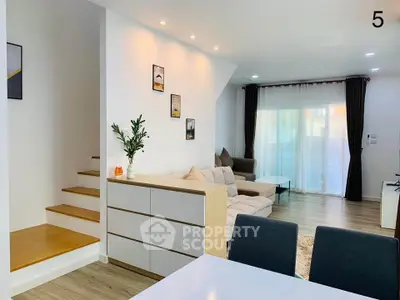 Modern living room with stylish decor and cozy seating area