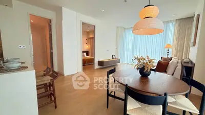 Spacious modern living room with dining area and natural light