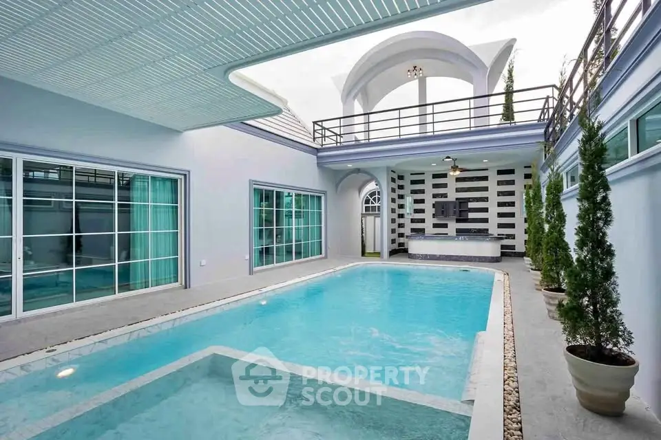 Luxurious modern home with private indoor pool and elegant architectural design.