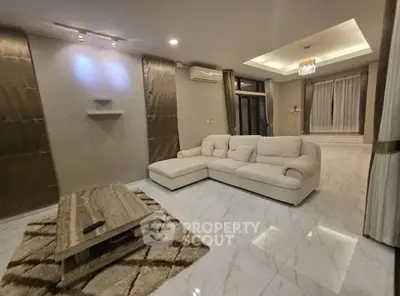 Luxurious modern living room with elegant decor and spacious layout
