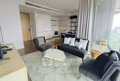 Luxurious modern living room with open kitchen and stunning city view