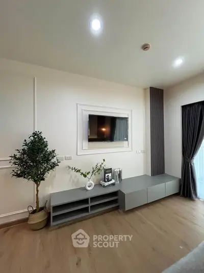 Modern living room with sleek TV setup and elegant decor