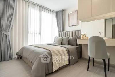 Modern bedroom with elegant decor and natural light