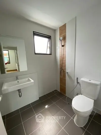 Modern bathroom with sleek fixtures and natural light